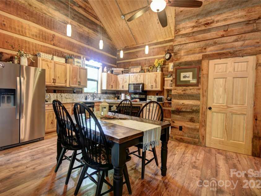 120 Spotted Fawn Lane, Waynesville, NC 28785.  MLS# CAR4284528, YatesRealty ID 34742. Dining Area into the kitchen