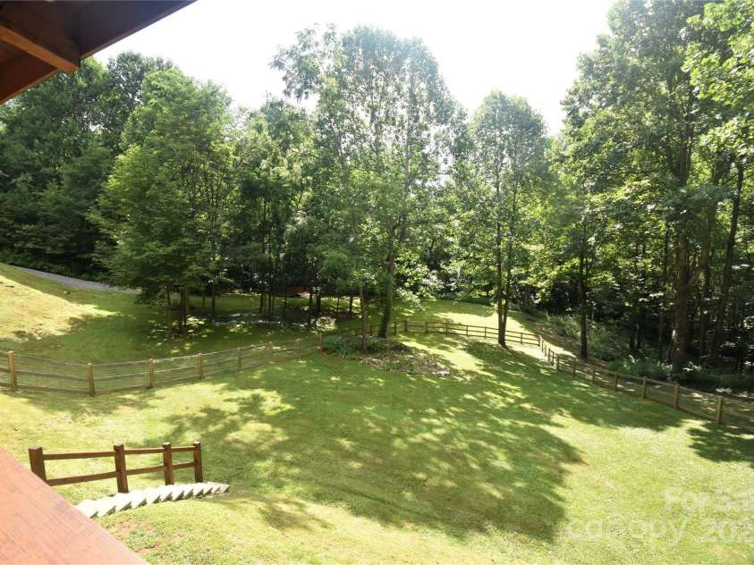 120 Spotted Fawn Lane, Waynesville, NC 28785.  MLS# CAR4284528, YatesRealty ID 34742. More of the beautiful property as seen from the deck/ porch