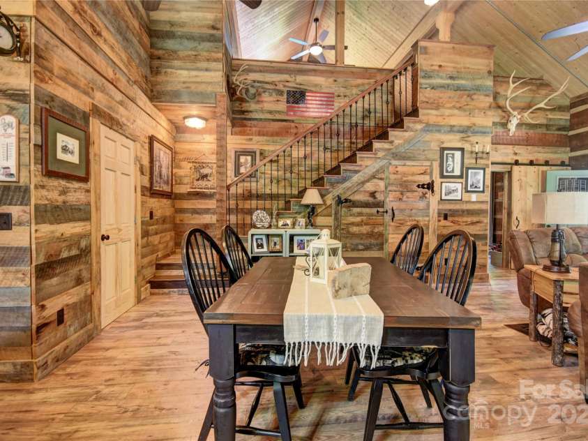 120 Spotted Fawn Lane, Waynesville, NC 28785.  MLS# CAR4284528, YatesRealty ID 34742. Stairs from the great room to the loft area