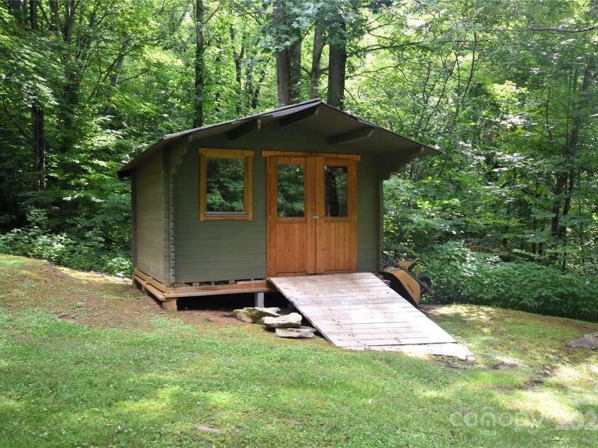 120 Spotted Fawn Lane, Waynesville, NC 28785.  MLS# CAR4284528, YatesRealty ID 34742. Utility Building down the hill from the home