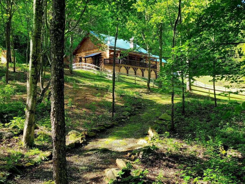 120 Spotted Fawn Lane, Waynesville, NC 28785.  MLS# CAR4284528, YatesRealty ID 34742. View of home looking up from the Fire Pit