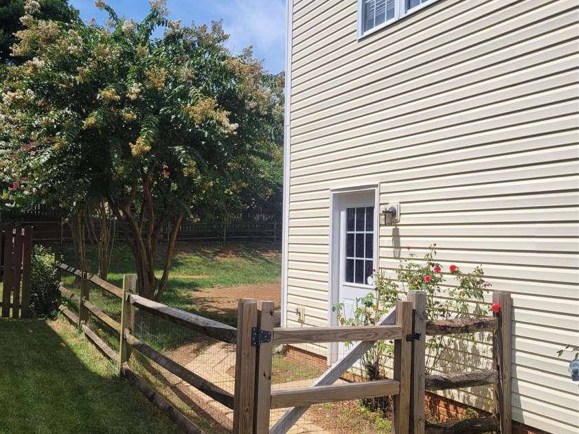 17240 Georgian Hall Drive, Charlotte, NC 28277.  MLS# CAR4296135, YatesRealty ID 34747. Side Yard, door to garage