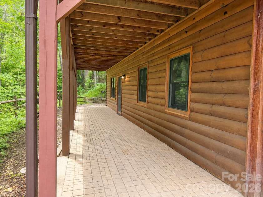 115 Paso Fino Drive, Maggie Valley, NC 28751.  MLS# CAR4382890, YatesRealty ID 34748. BASEMENT PATIO