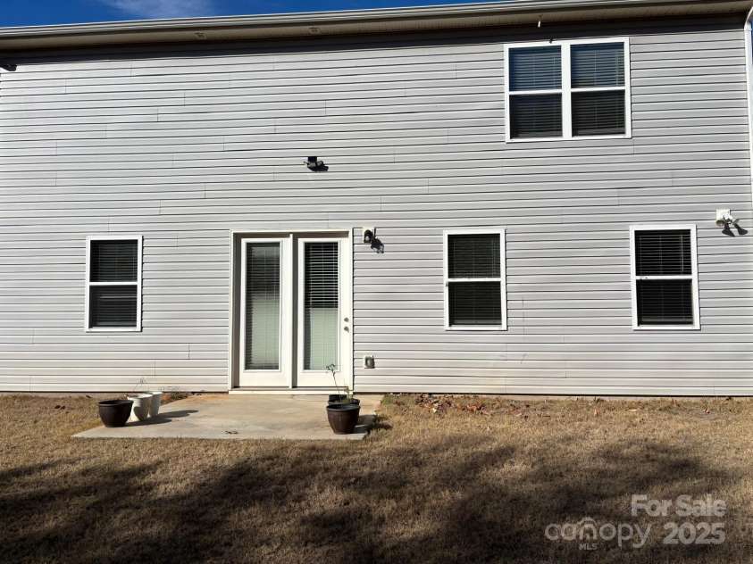 7121 Maple Run Circle, Charlotte, NC 28215.  MLS# CAR4329824, YatesRealty ID 3475. Back view