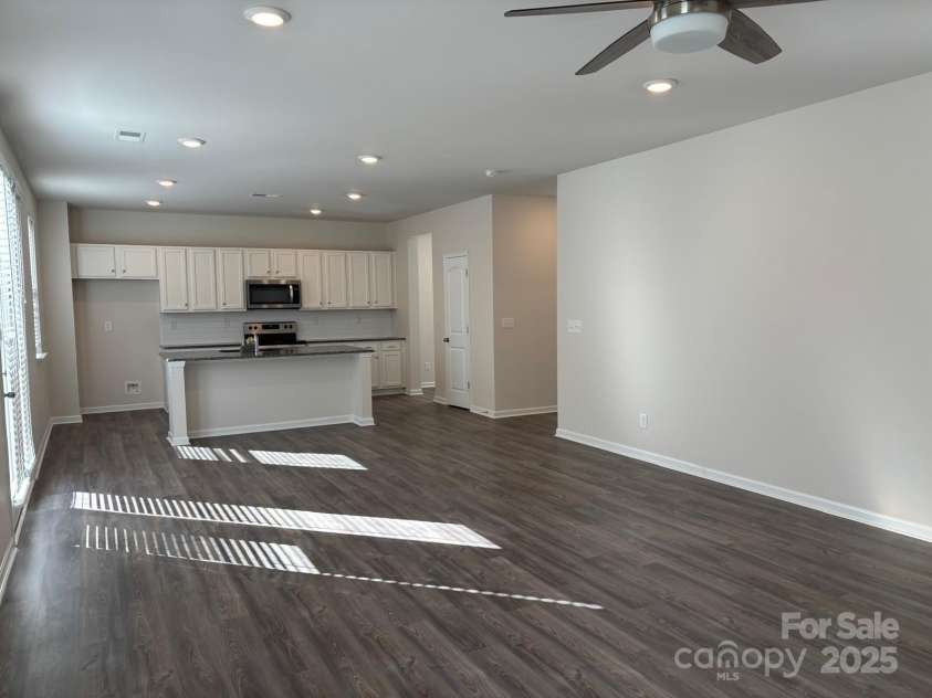 7121 Maple Run Circle, Charlotte, NC 28215.  MLS# CAR4329824, YatesRealty ID 3475. Living Room View 1