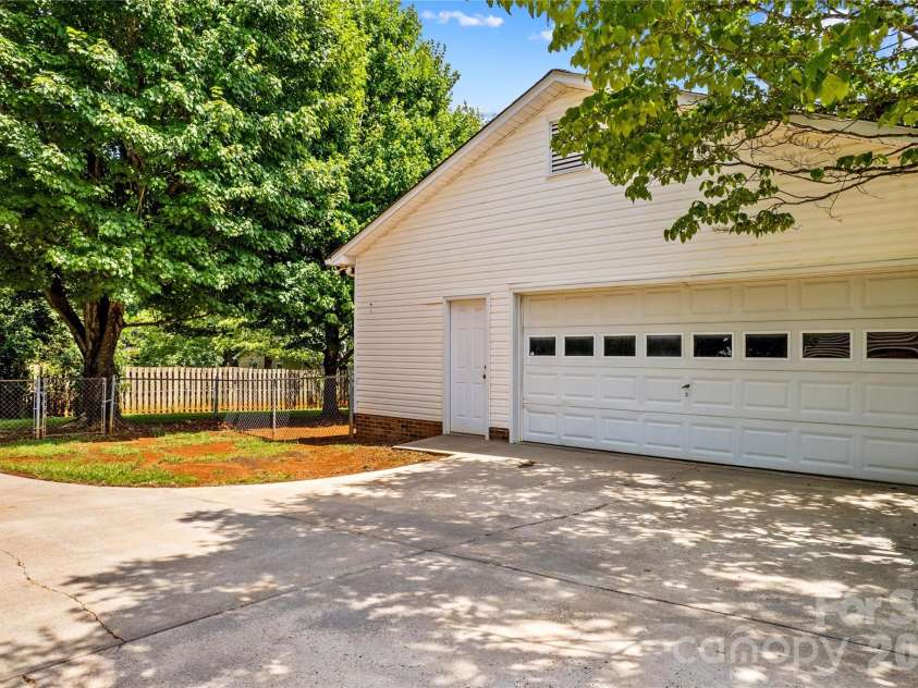 1115 Joy Street, Salisbury, NC 28147.  MLS# CAR4395277, YatesRealty ID 34751. Side load garage