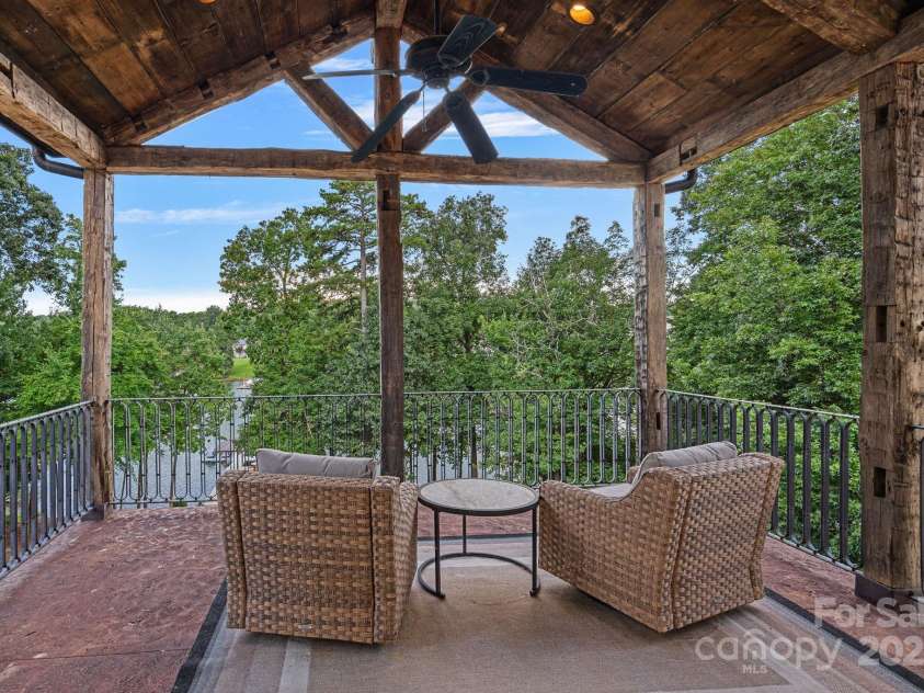 6821 Pebble Bay Drive, Denver, NC 28037.  MLS# CAR4292691, YatesRealty ID 34754. 2nd floor veranda from the secondary suite