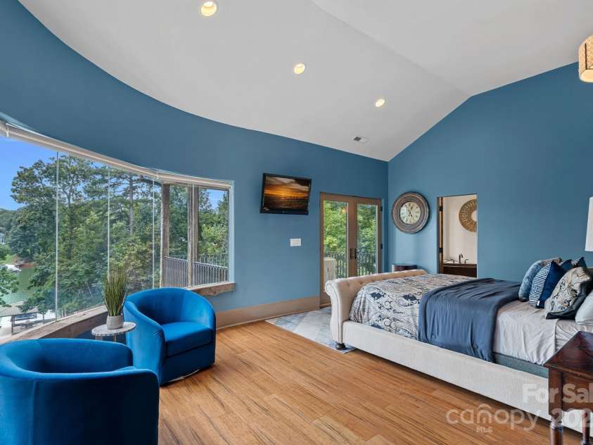 6821 Pebble Bay Drive, Denver, NC 28037.  MLS# CAR4292691, YatesRealty ID 34754. Secondary bedroom suite with gorgeous views and access to a private veranda.