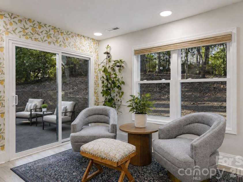 16 Tanglewood Road, Lake Wylie, SC 29710.  MLS# CAR4396441, YatesRealty ID 34757. Breakfast or dining area overlooking private backyard.