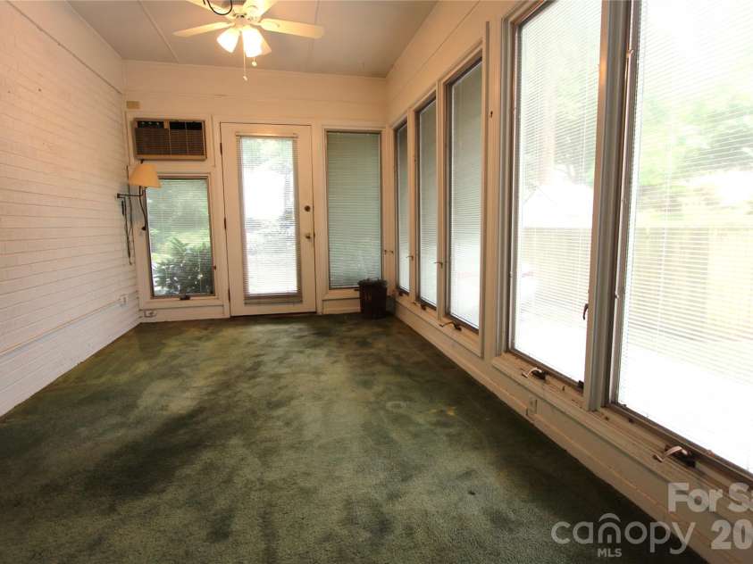 821 Burnley Road, Charlotte, NC 28210.  MLS# CAR4372249, YatesRealty ID 34762. Enclosed Sun Room