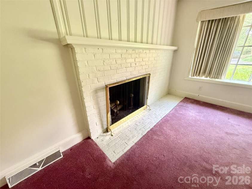 821 Burnley Road, Charlotte, NC 28210.  MLS# CAR4372249, YatesRealty ID 34762. Wood burning fireplace