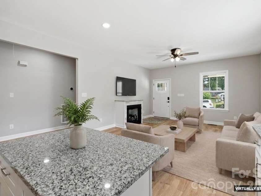 404 Williamson Street, Fort Mill, SC 29715.  MLS# CAR4396428, YatesRealty ID 34763. Living room virtually staged