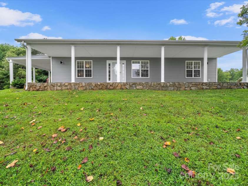 1585 Nathanial Street, Newton, NC 28658.  MLS# CAR4289013, YatesRealty ID 34764. Long covered front porch