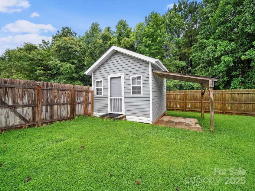 1585 Nathanial Street, Newton, NC 28658.  MLS# CAR4289013, YatesRealty ID 34764. Storage/work shed with electricity