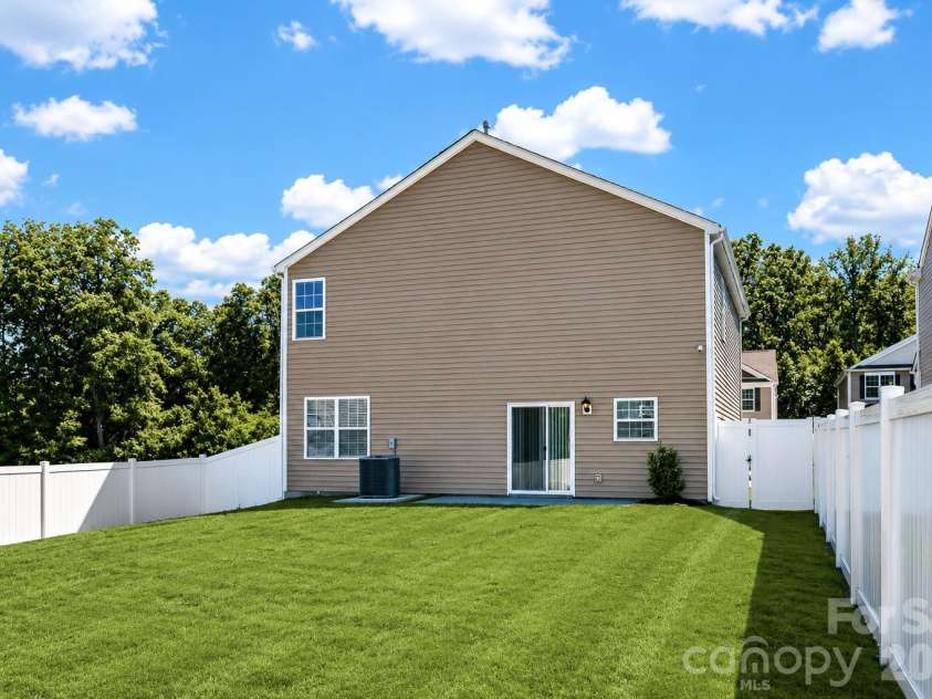2023 Navarro Road, Charlotte, NC 28214.  MLS# CAR4394895, YatesRealty ID 34765. Grass digitally enhanced