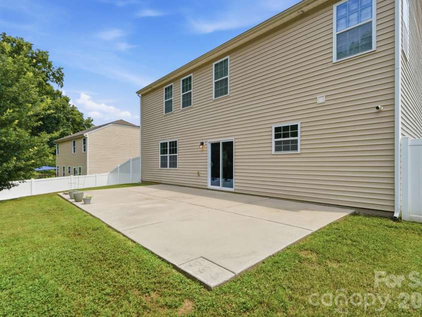 137 Rippling Water Drive, Mount Holly, NC 28120.  MLS# CAR4396170, YatesRealty ID 34767. Backyard 1