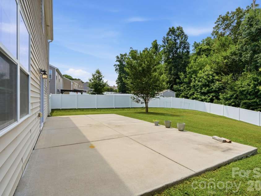 137 Rippling Water Drive, Mount Holly, NC 28120.  MLS# CAR4396170, YatesRealty ID 34767. Backyard 3