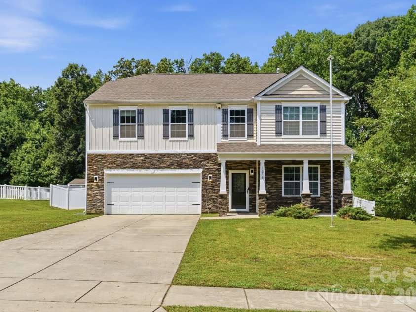 137 Rippling Water Drive, Mount Holly, NC 28120.  MLS# CAR4396170, YatesRealty ID 34767. Front 1