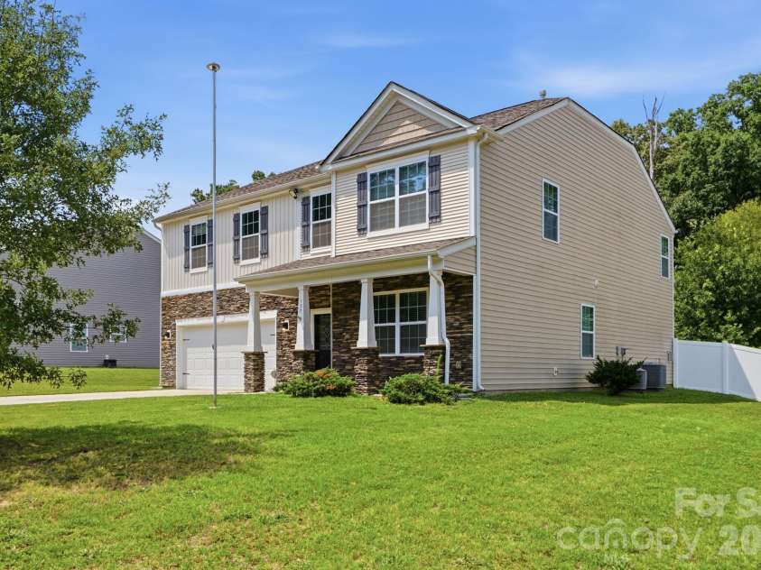 137 Rippling Water Drive, Mount Holly, NC 28120.  MLS# CAR4396170, YatesRealty ID 34767. Front 2