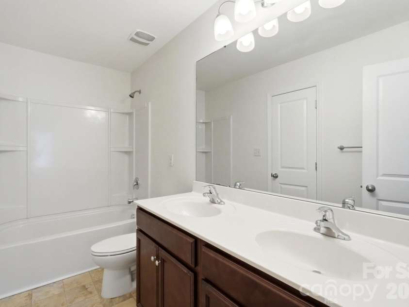 137 Rippling Water Drive, Mount Holly, NC 28120.  MLS# CAR4396170, YatesRealty ID 34767. Full Bathroom 1