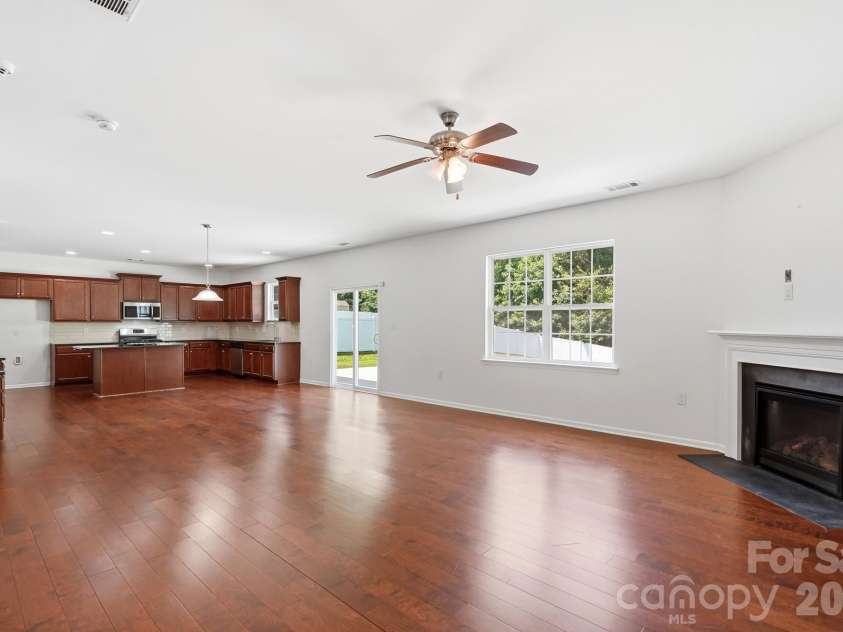 137 Rippling Water Drive, Mount Holly, NC 28120.  MLS# CAR4396170, YatesRealty ID 34767. Kitchen/Living Room
