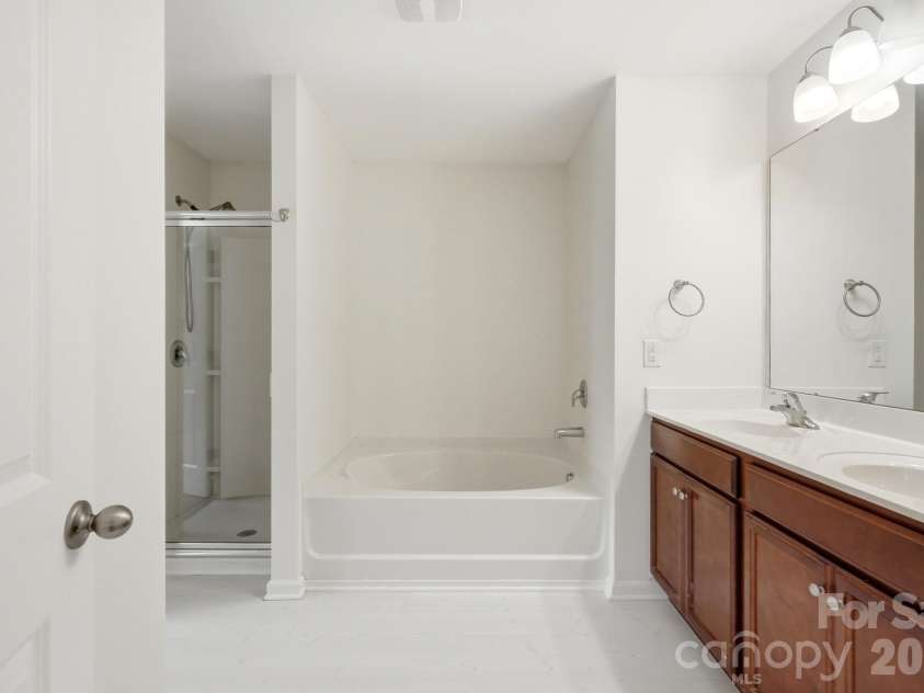 137 Rippling Water Drive, Mount Holly, NC 28120.  MLS# CAR4396170, YatesRealty ID 34767. Primary Bathroom