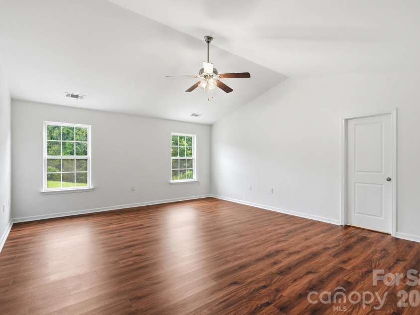 137 Rippling Water Drive, Mount Holly, NC 28120.  MLS# CAR4396170, YatesRealty ID 34767. Primary Bedroom