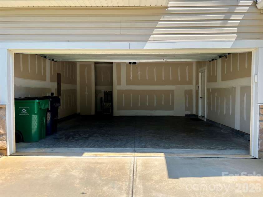 6629 Meridale Forest Drive, Charlotte, NC 28269.  MLS# CAR4385620, YatesRealty ID 34770. 2 Car Garage#1