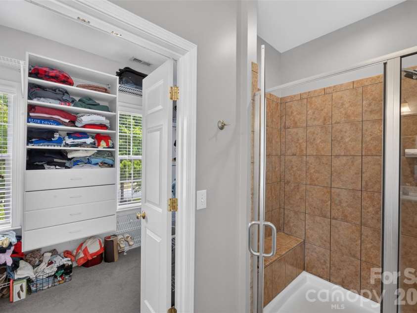 9220 Kensington Forest Drive, Harrisburg, NC 28075.  MLS# CAR4396043, YatesRealty ID 34771. Primary Bathroom