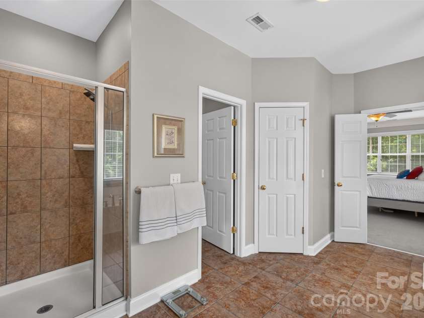 9220 Kensington Forest Drive, Harrisburg, NC 28075.  MLS# CAR4396043, YatesRealty ID 34771. Primary Bathroom