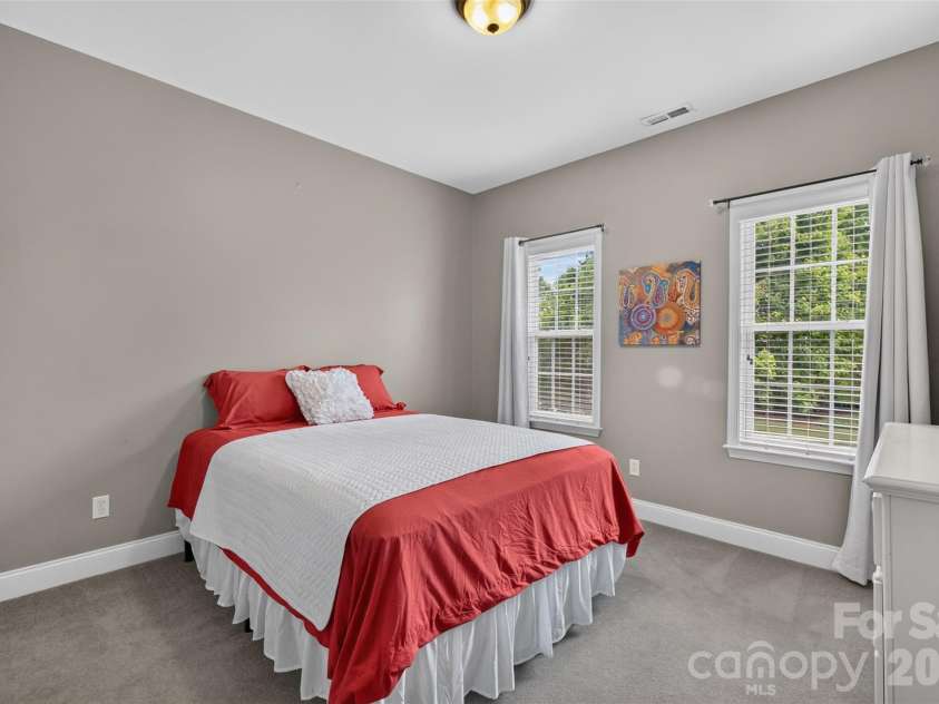 9220 Kensington Forest Drive, Harrisburg, NC 28075.  MLS# CAR4396043, YatesRealty ID 34771. Upstairs Bedroom #2 with Direct Access to Hall Bath