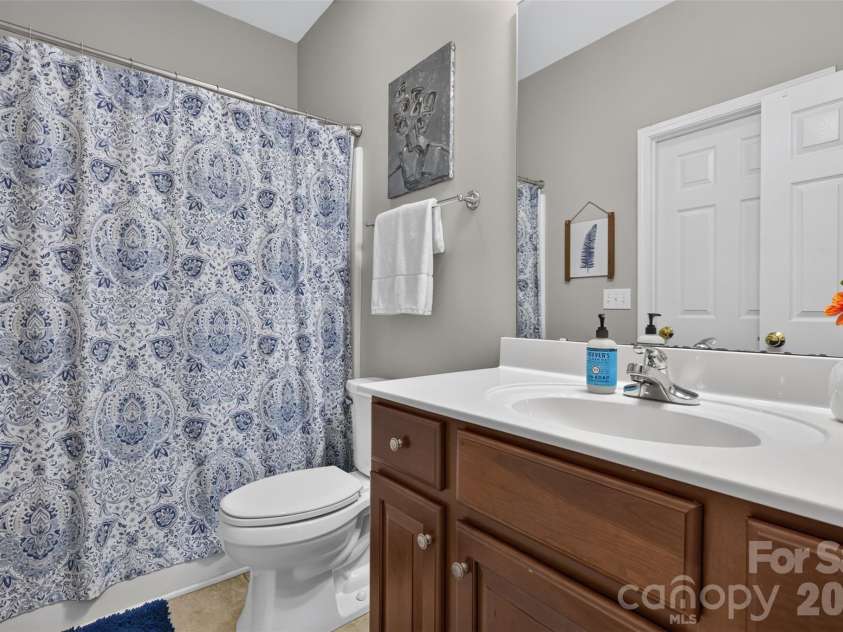 9220 Kensington Forest Drive, Harrisburg, NC 28075.  MLS# CAR4396043, YatesRealty ID 34771. Upstairs Hall Bath