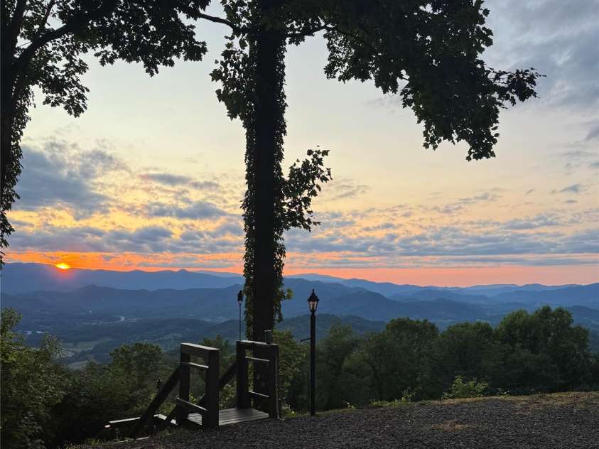 153 Windalier Lane, Waynesville, NC 28786.  MLS# CAR4398606, YatesRealty ID 34774. Sunset from the deck