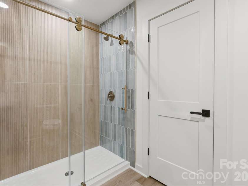 9472 Caddell Road, Fort Mill, SC 29707.  MLS# CAR4389015, YatesRealty ID 34780. Custom tiled shower