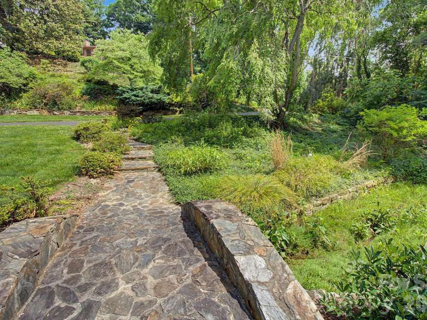 22 Mayfair Drive, Candler, NC 28715.  MLS# CAR4391102, YatesRealty ID 34782. Bridge and walkway 