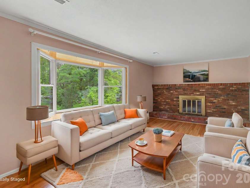 22 Mayfair Drive, Candler, NC 28715.  MLS# CAR4391102, YatesRealty ID 34782. Living Room virtually staged