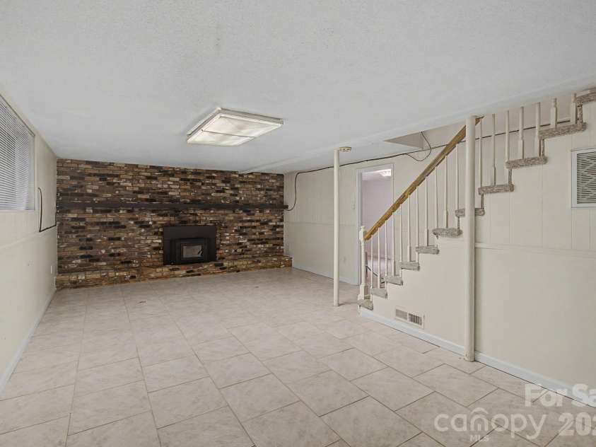 22 Mayfair Drive, Candler, NC 28715.  MLS# CAR4391102, YatesRealty ID 34782. Lower Recreation Room