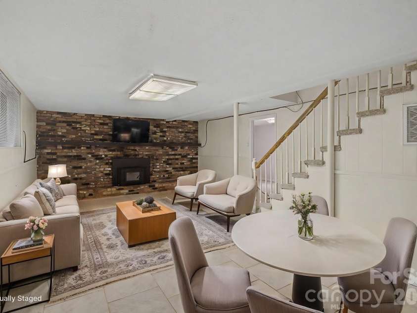 22 Mayfair Drive, Candler, NC 28715.  MLS# CAR4391102, YatesRealty ID 34782. Recreation Room virtually staged