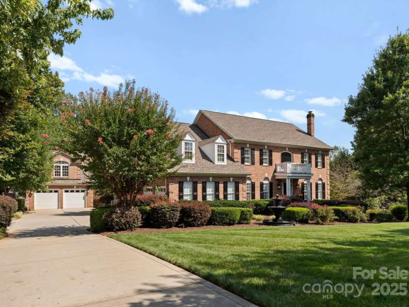 239 Kimberly Road, Davidson, NC 28036.  MLS# CAR4288776, YatesRealty ID 34782. Stately full brick home