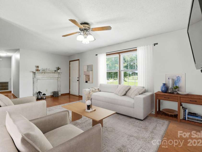 1751 Buffalo Shoals Road, Statesville, NC 28677.  MLS# CAR4293202, YatesRealty ID 34783. Livingroom virtually staged