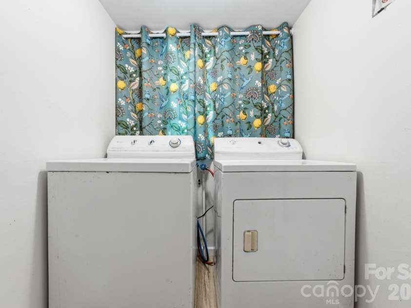 583 Dark Ridge Road, Sylva, NC 28779.  MLS# CAR4394353, YatesRealty ID 34785. Laundry area off Guest Bathroom