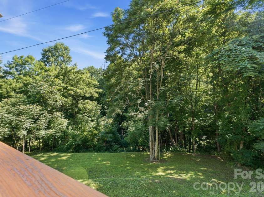 583 Dark Ridge Road, Sylva, NC 28779.  MLS# CAR4394353, YatesRealty ID 34785. View of cleared rear yard from deck