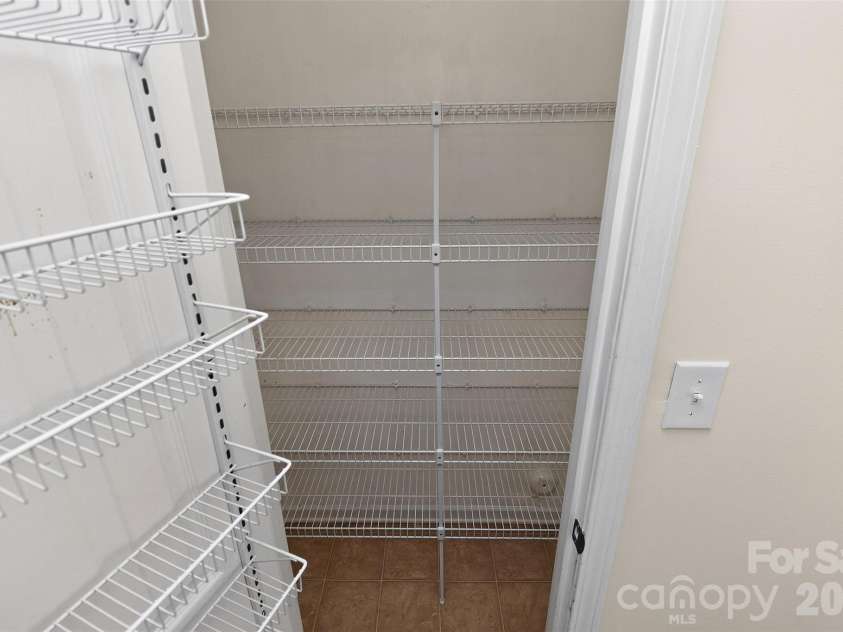 2043 Grimley Lane, Fort Mill, SC 29707.  MLS# CAR4397584, YatesRealty ID 34788. Kitchen Pantry 