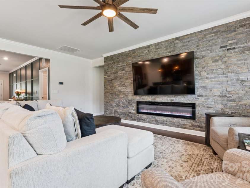 3850 Longmore Lane, Kannapolis, NC 28081.  MLS# CAR4394364, YatesRealty ID 34789. Custom stone feature wall with electric fireplace