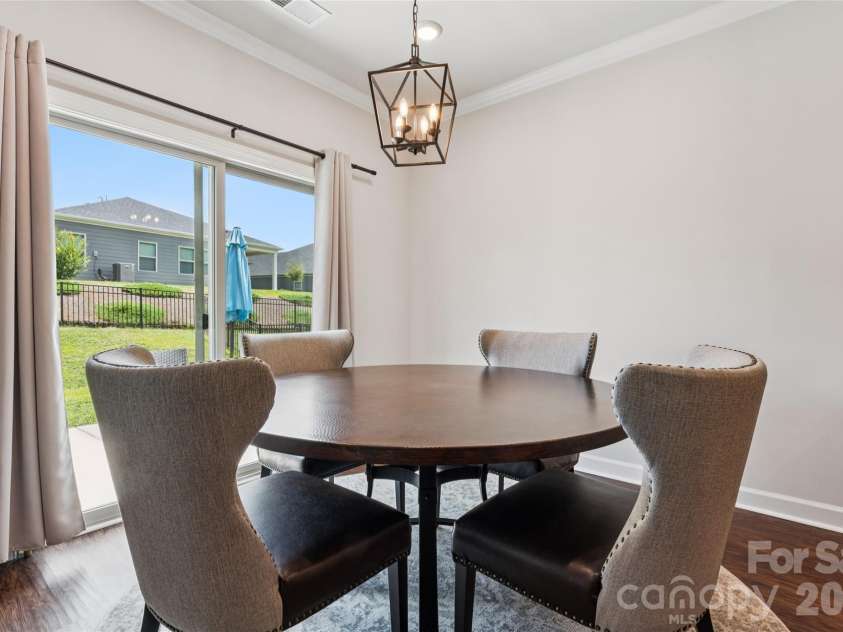 3850 Longmore Lane, Kannapolis, NC 28081.  MLS# CAR4394364, YatesRealty ID 34789. Dining area leading to the back yard