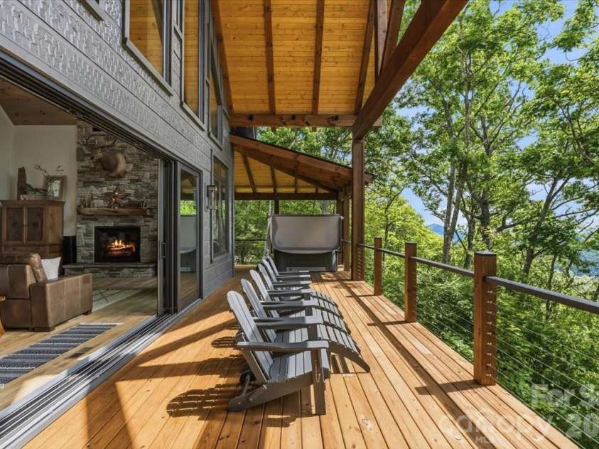241 Ataya Trail, Maggie Valley, NC 28751.  MLS# CAR4397152, YatesRealty ID 34790. 12 foot deep porch