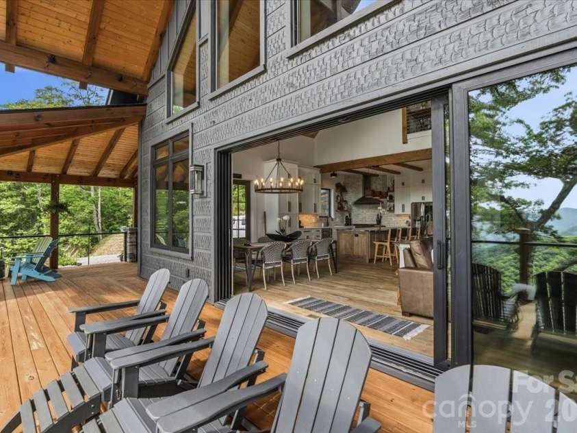 241 Ataya Trail, Maggie Valley, NC 28751.  MLS# CAR4397152, YatesRealty ID 34790. 12 foot deep porch