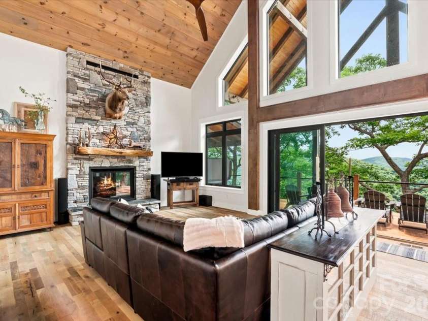 241 Ataya Trail, Maggie Valley, NC 28751.  MLS# CAR4397152, YatesRealty ID 34790. Main Living with 16ft retractable door