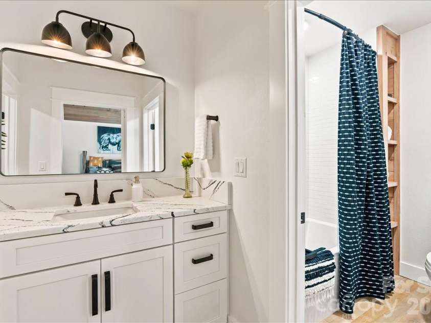 241 Ataya Trail, Maggie Valley, NC 28751.  MLS# CAR4397152, YatesRealty ID 34790. Upstairs secondary bathroom