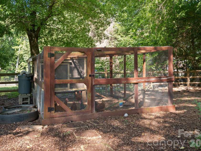 1307 Bennington Drive, Concord, NC 28027.  MLS# CAR4394674, YatesRealty ID 34794. Chicken coop can convey